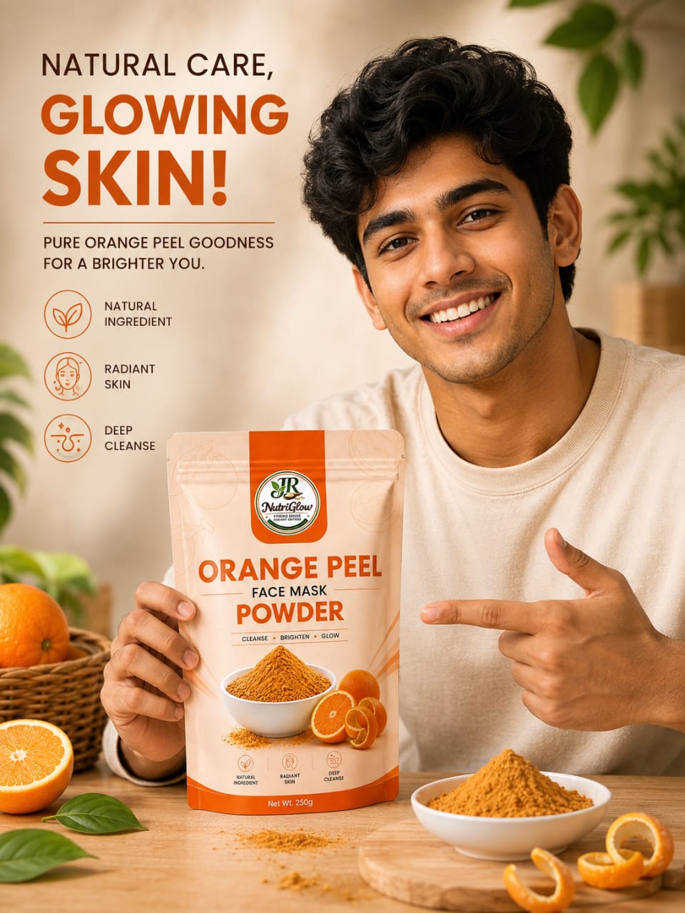 A smiling man holds and points to a NutriGlow Orange Peel Face Mask Powder pouch, with oranges, orange peels, and orange powder displayed around him.